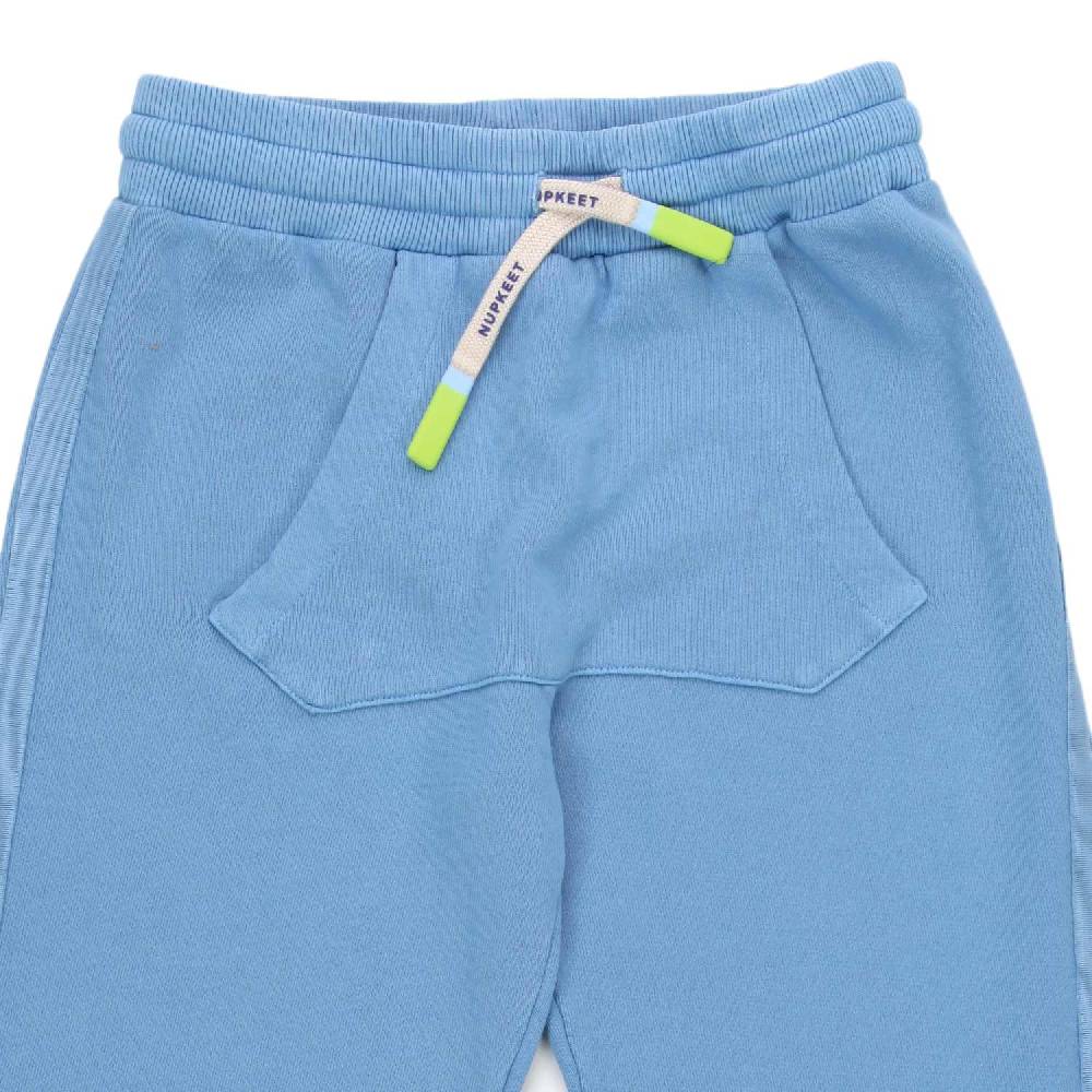 Nupkeet Pantalone Pemba indaco con marsupio Negozio